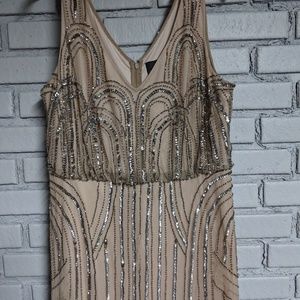 Sleeveless blouson gown with art nouveau beading